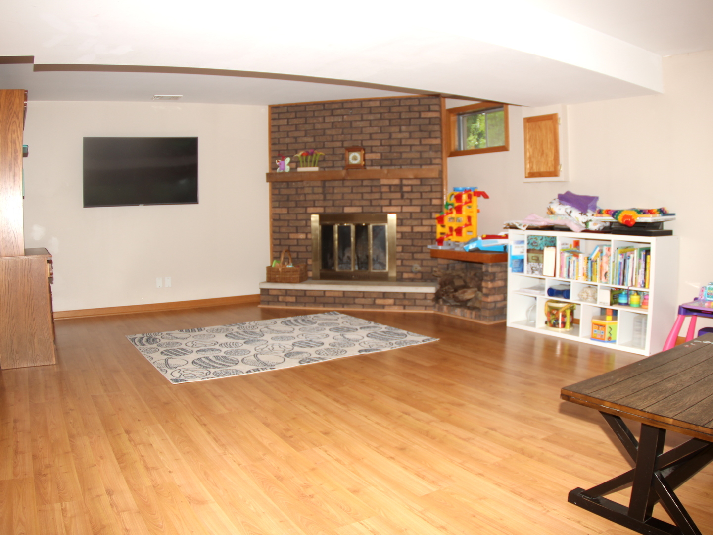 260 Thomas Street Cary, IL 60013 - Photo 10 of 16 a living room with fireplace furniture and a flat screen tv