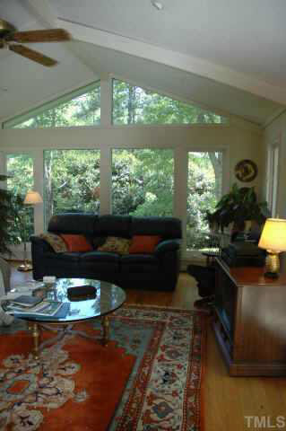 7228 Madiera Court Raleigh, NC 27615 - Photo 5 of 9 a living room with furniture and a large window