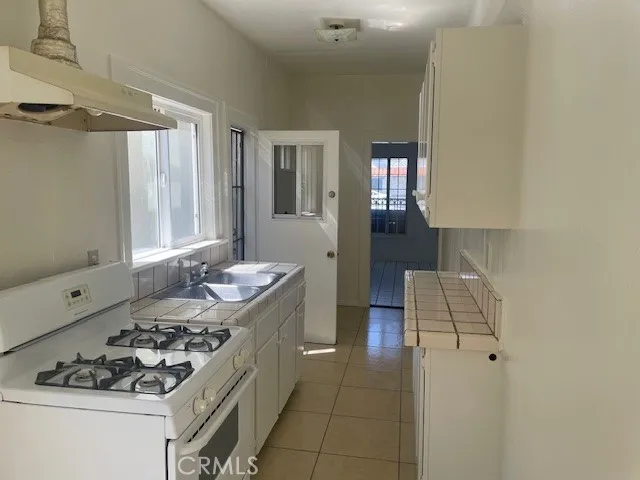 a bathroom with a sink toilet and vanity