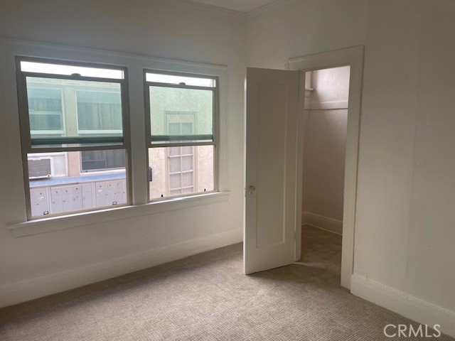 1738 East 4th Street, Unit 1 Long Beach, CA 90802 - Photo 18 of 23 an empty room with a window