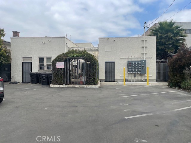 1738 East 4th Street, Unit 1 Long Beach, CA 90802 - Photo 2 of 23 a view of a building with a garden