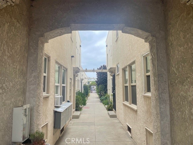 1738 East 4th Street, Unit 1 Long Beach, CA 90802 - Photo 8 of 23 a view of a narrow alley