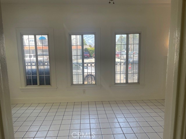 1738 East 4th Street, Unit 1 Long Beach, CA 90802 - Photo 10 of 23 an empty room with windows