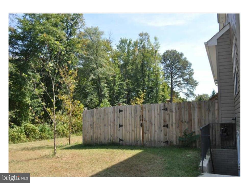 8818 Tall Cedars Lane Clinton, MD 20735 - Photo 13 of 23 Exterior (Rear)