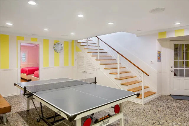 a room with lots of furniture and windows