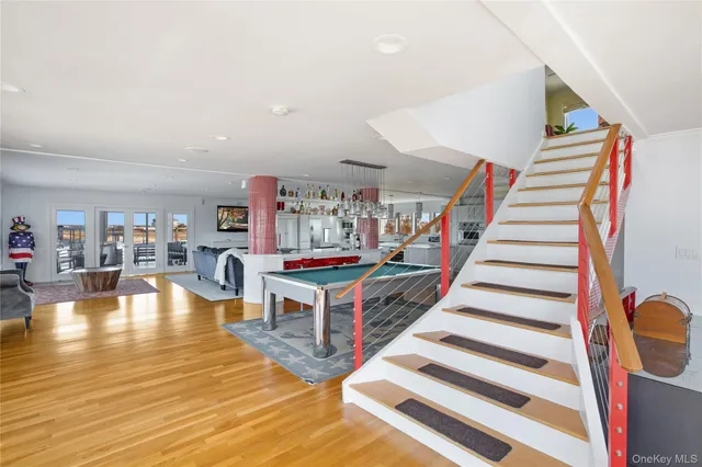 a living room with furniture and a table
