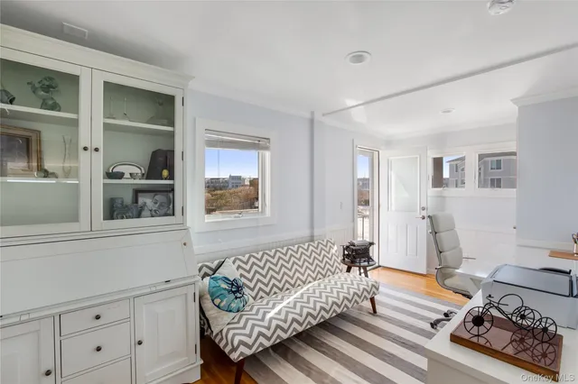 a bedroom with bed and window
