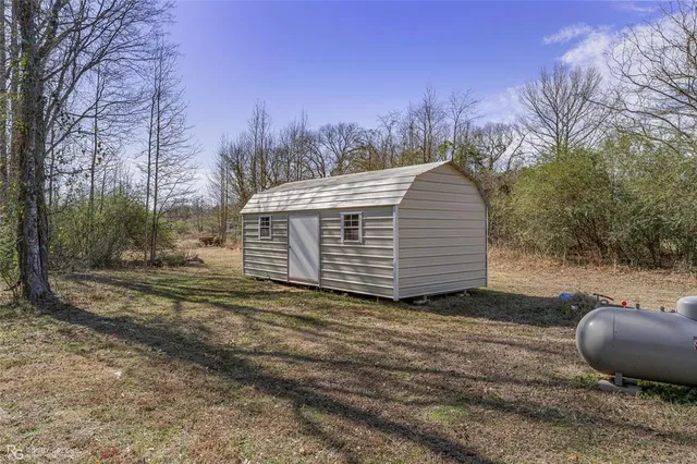 a view of an empty room with a chair
