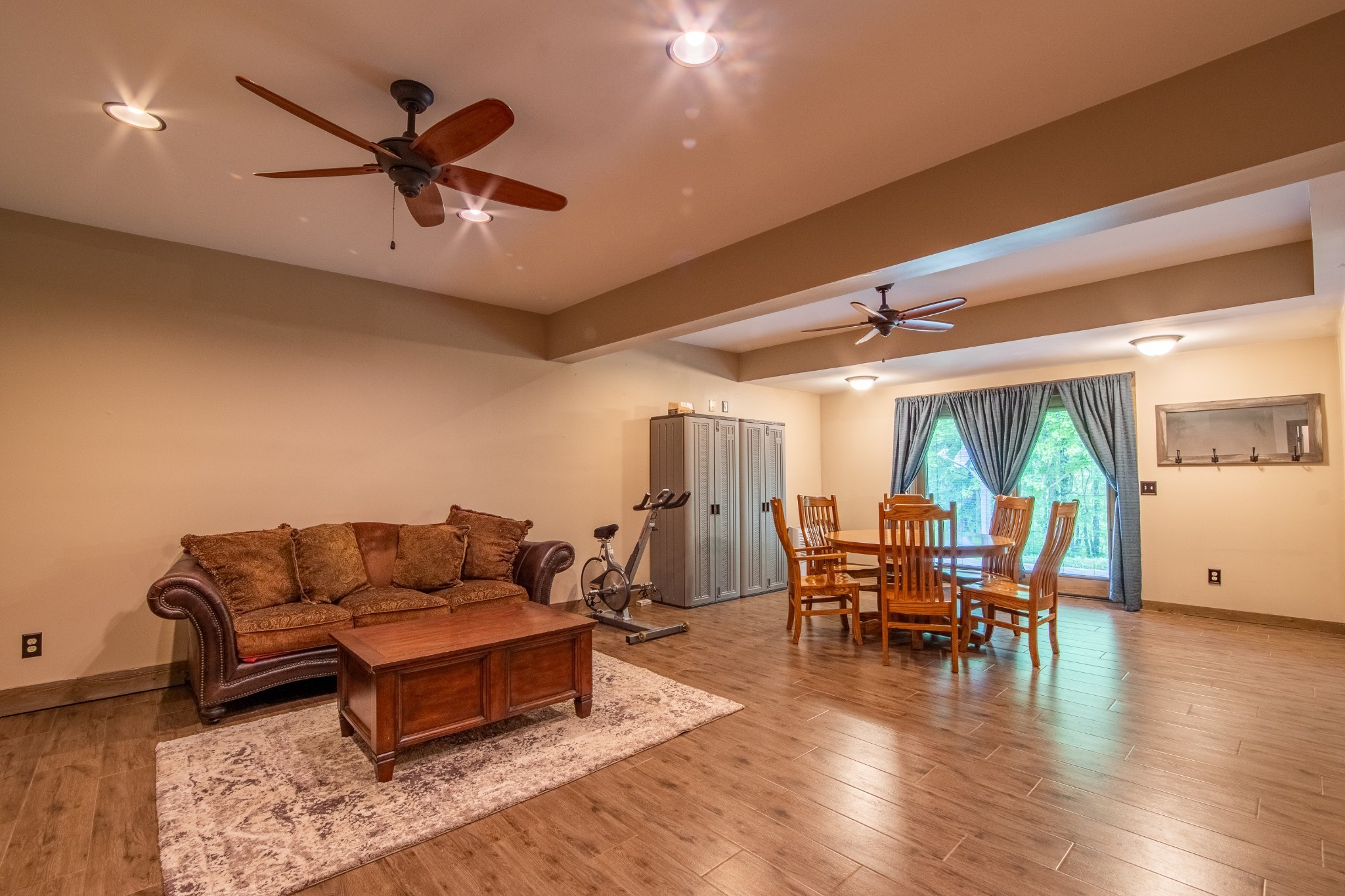 102 Highwater Road Waverly, TN 37185 - Photo 28 of 43 a living room with furniture floor to ceiling window and wooden floor