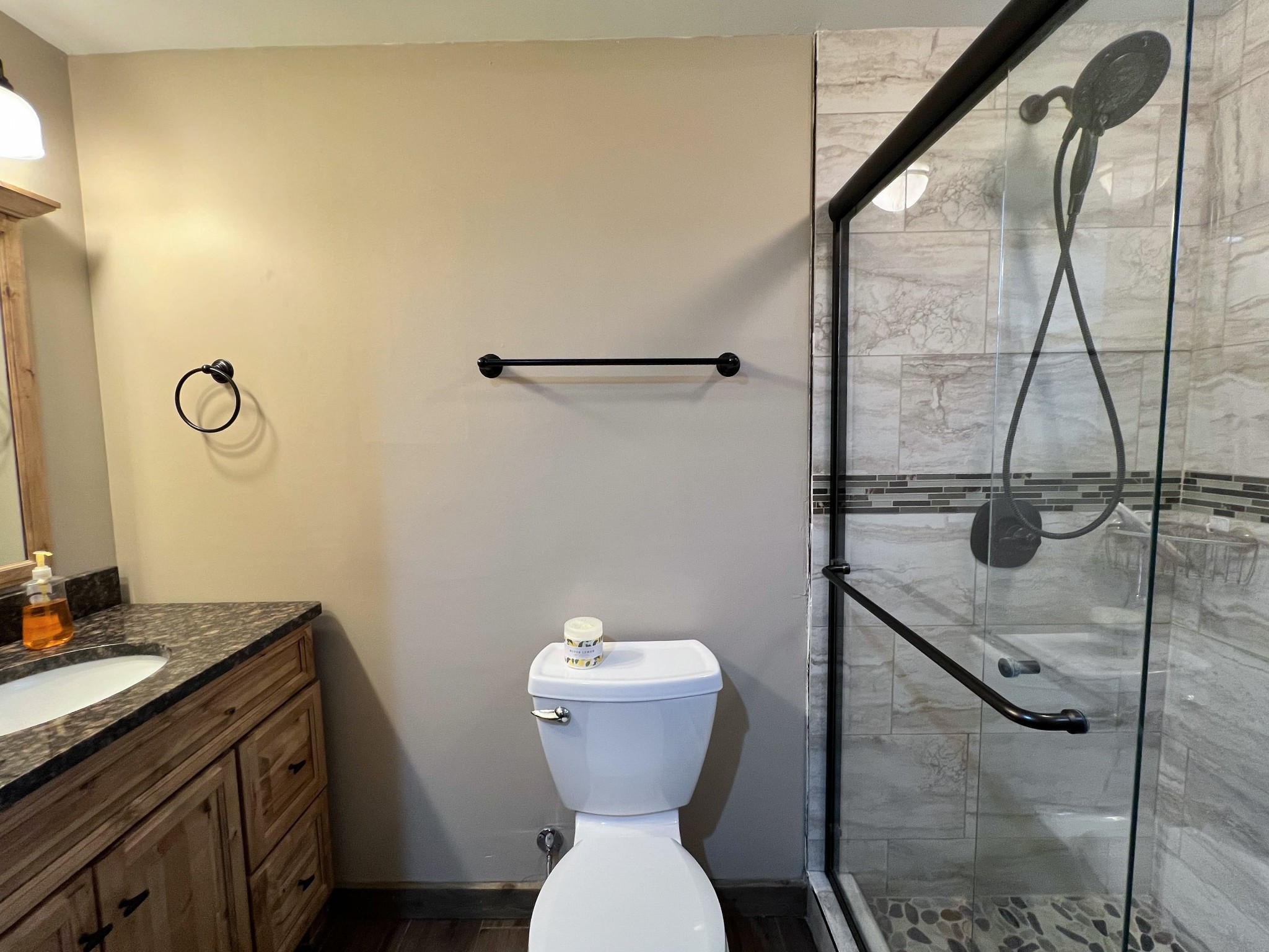 102 Highwater Road Waverly, TN 37185 - Photo 35 of 43 a bathroom with a granite countertop sink toilet and a mirror