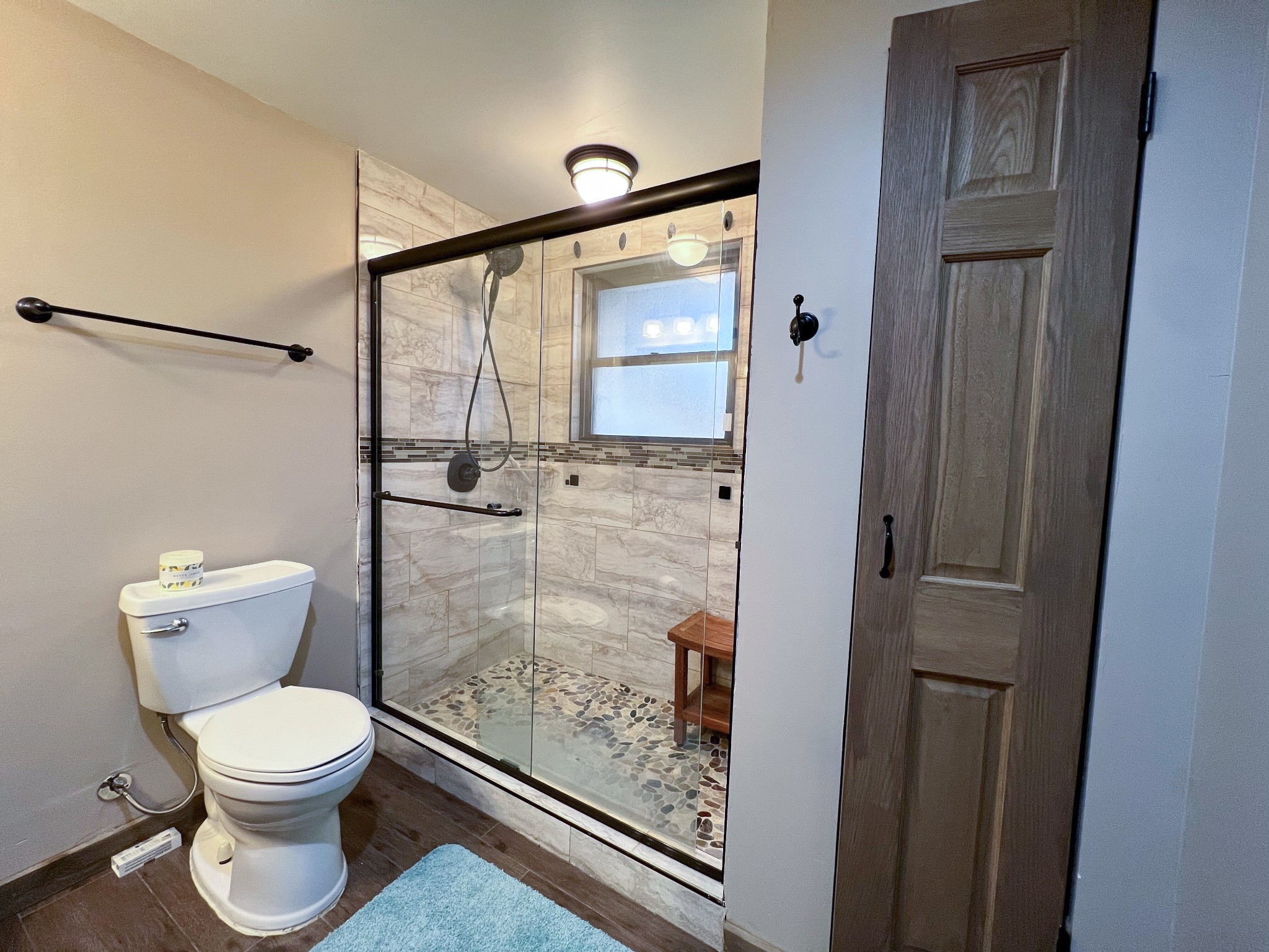 102 Highwater Road Waverly, TN 37185 - Photo 37 of 43 a bathroom with a toilet and a shower