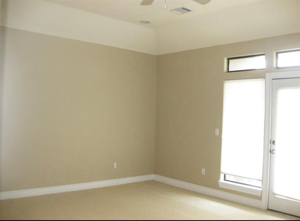 1623 Stuart Street Houston, TX 77004 - Photo 14 of 24 The 3rd floor has a spacious primary bedroom which can easily accommodate a king sized suite. The primary bedroom opens to it's own balcony