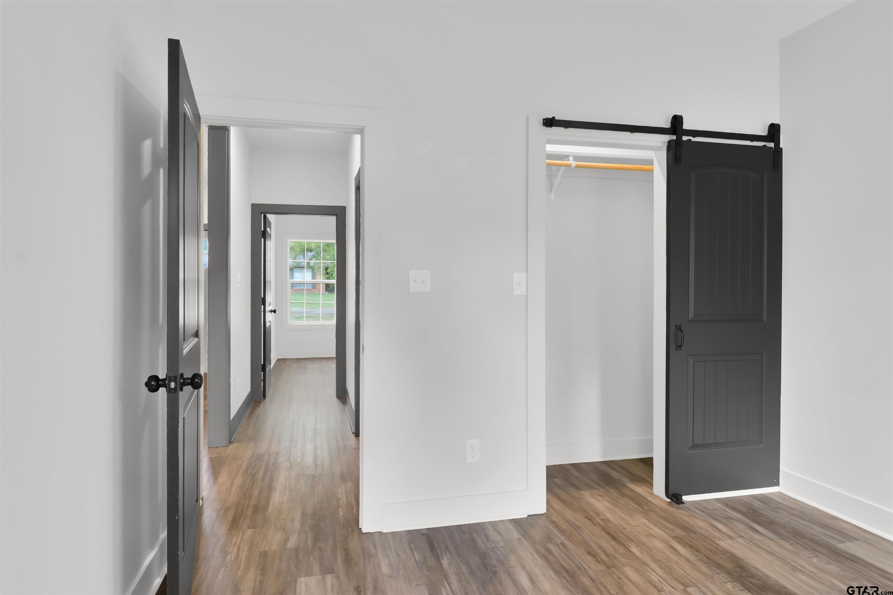 220 Sherman Street Rusk, TX 75785 - Photo 25 of 33 an empty room and wooden floor