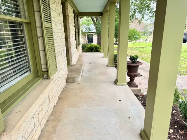 a front view of a house with a porch
