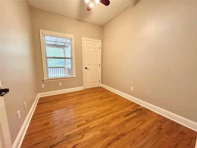 a view of entryway with wooden floor and stairs