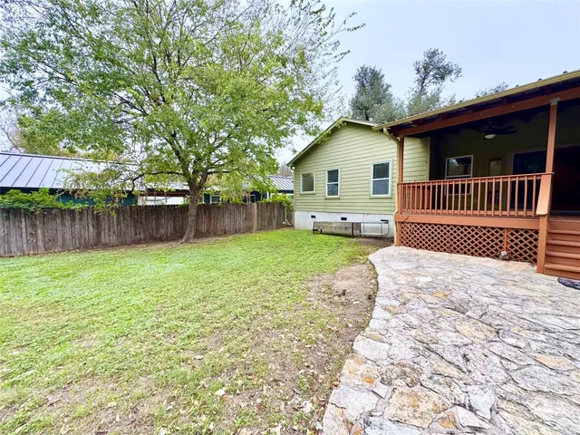 a view of a lake with a large trees