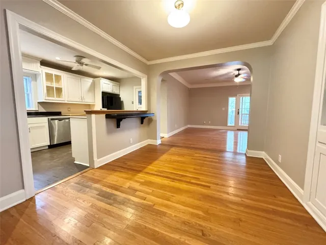 a view of a kitchen from the hallway