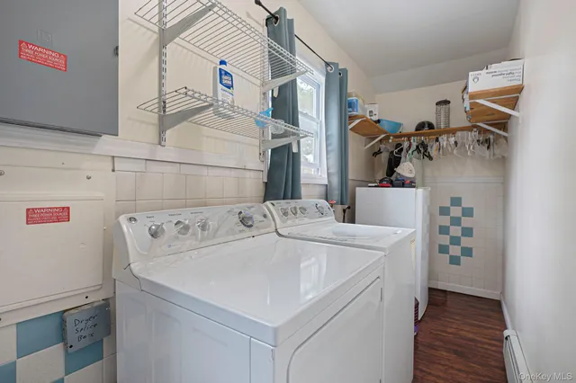 a utility room with dryer and washer