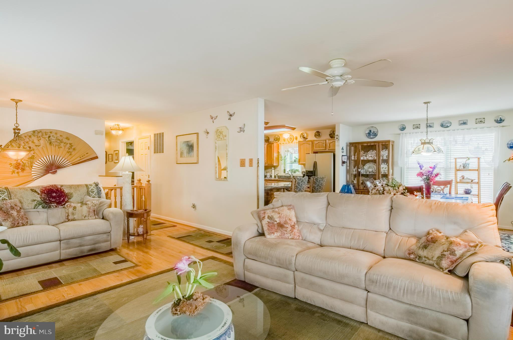 8620 Sandy Plains Road Baltimore, MD 21222 - Photo 5 of 30 a living room with furniture and a table