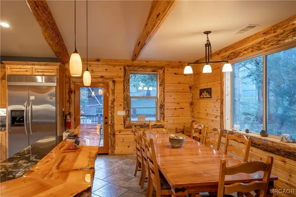 a view of a dining room with furniture