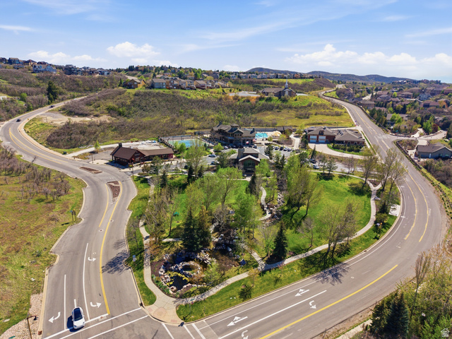 2007 Fielding Hill Lane Draper, UT 84020 - Photo 83 of 83 Aerial perspective showcasing a community park with mature trees, green spaces, and paved pathways