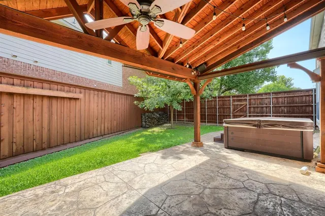 an aerial view of a house with pool outdoor seating and yard