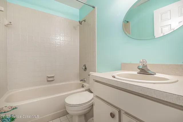 a bathroom with a sink a toilet and a bathtub