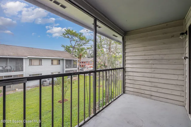 a view of a house with a balcony