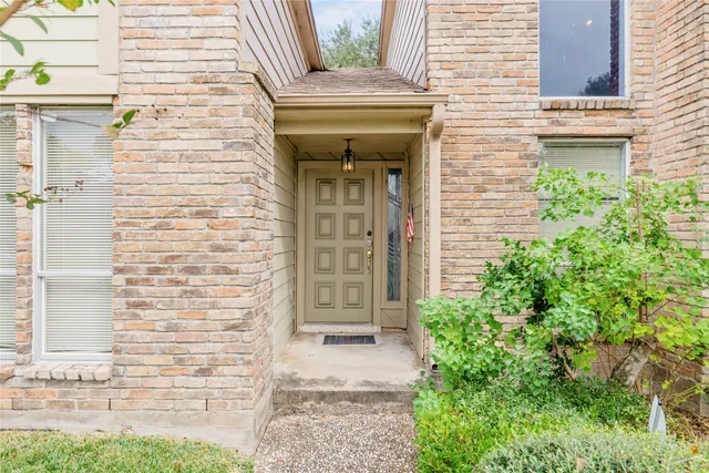 a front view of a house with a garage