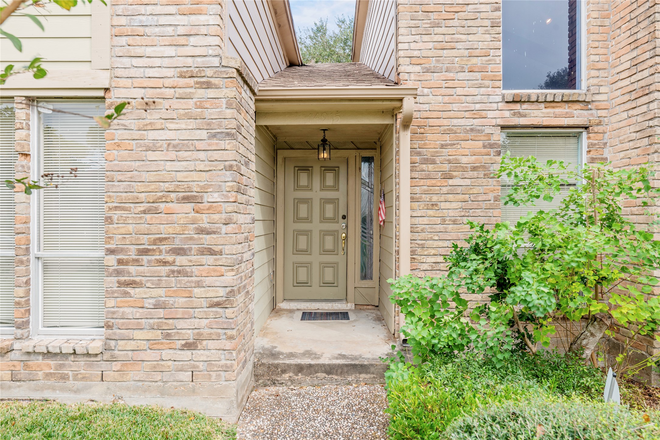 14915 Sun Harbor Drive Houston, TX 77062 - Photo 3 of 28 a front view of a house with a garage