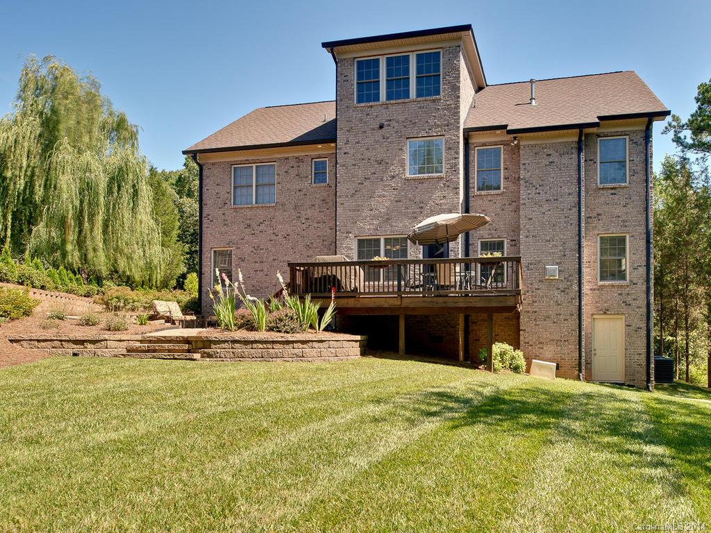 2641 Houston Branch Road Charlotte, NC 28270 - Photo 3 of 24 a front view of a house with garden