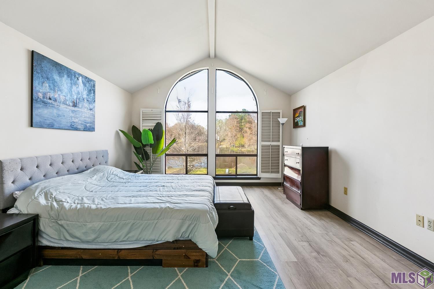 11675 Rue De Tonti Baton Rouge, LA 70810 - Photo 15 of 42 Primary Bedroom overlooking the lake