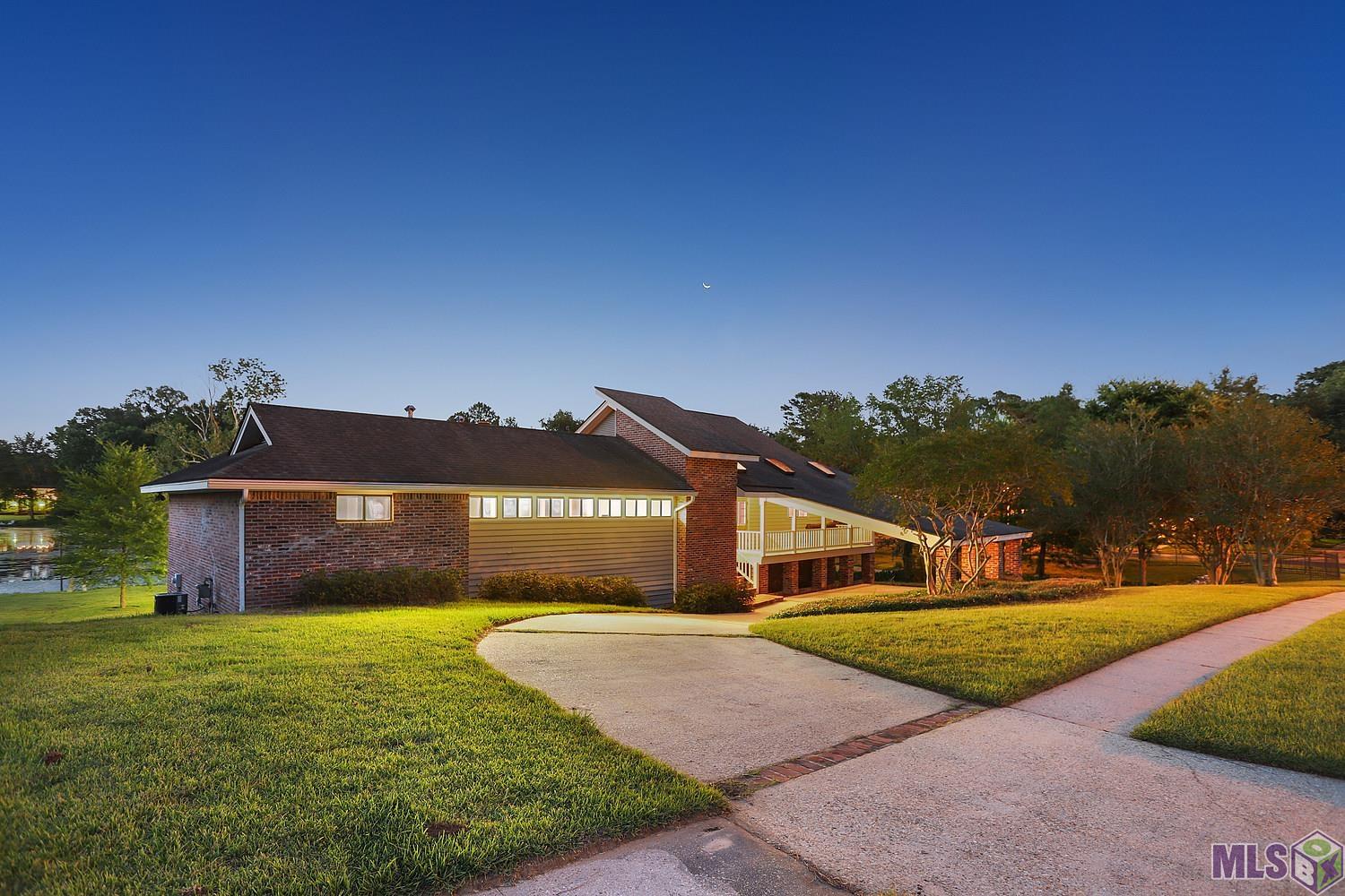 11675 Rue De Tonti Baton Rouge, LA 70810 - Photo 40 of 42 Dusk Side View of Home