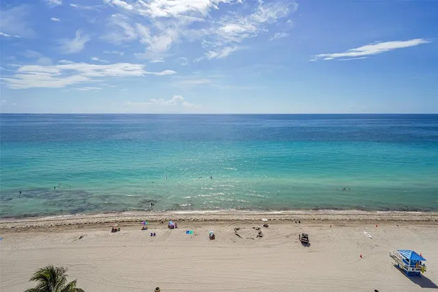 a view of an ocean beach and an entryway