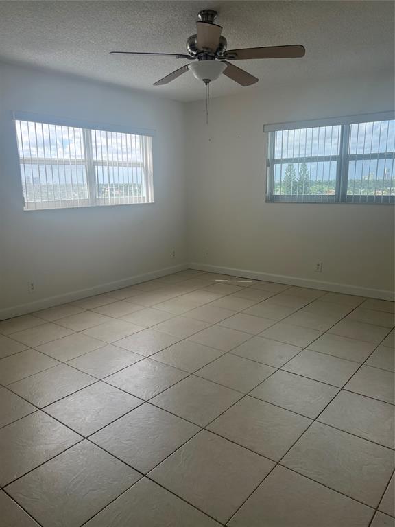 400 North Surf Road, Unit 806 Hollywood, FL 33019 - Photo 21 of 41 an empty room with windows