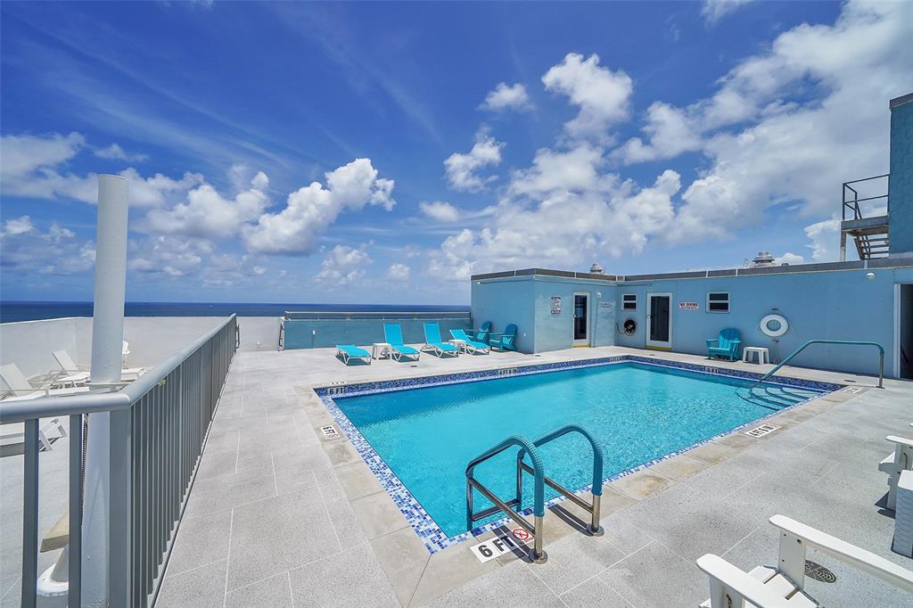 400 North Surf Road, Unit 806 Hollywood, FL 33019 - Photo 26 of 41 a view of a swimming pool with a patio