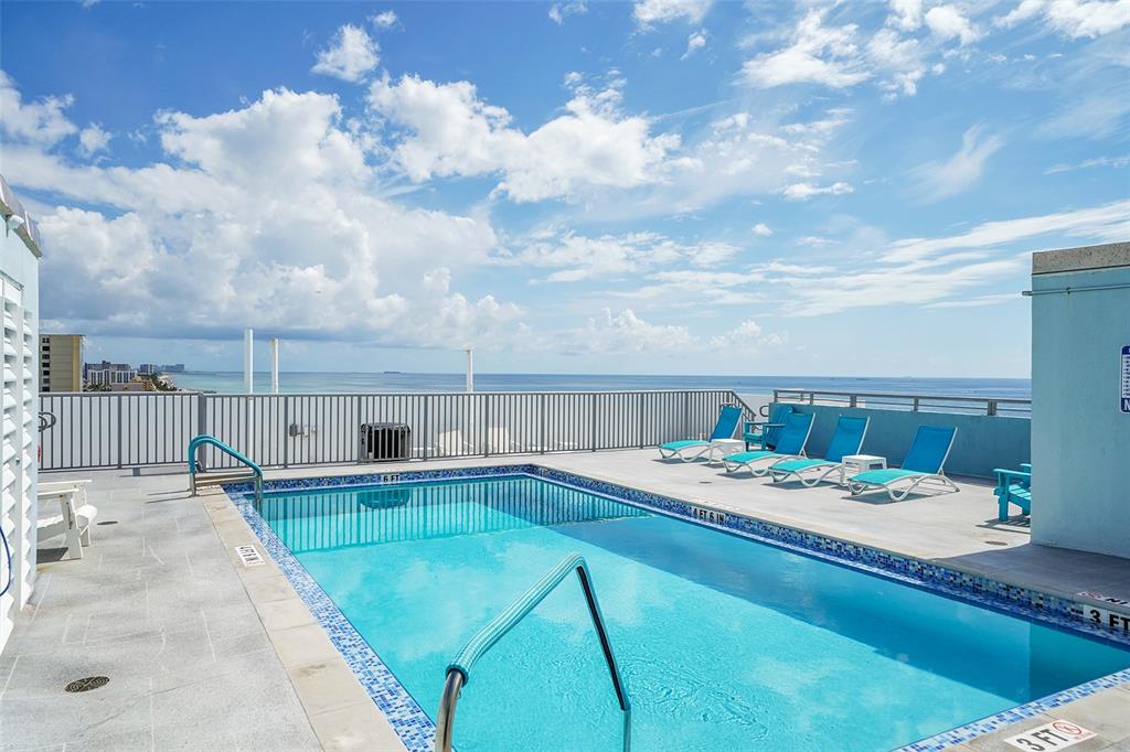 400 North Surf Road, Unit 806 Hollywood, FL 33019 - Photo 30 of 41 a view of a house with swimming pool and sitting area