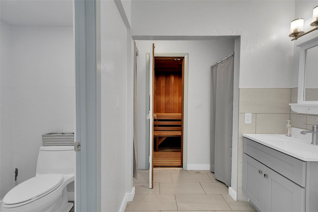 400 North Surf Road, Unit 806 Hollywood, FL 33019 - Photo 33 of 41 a bathroom with a sink a toilet and shower