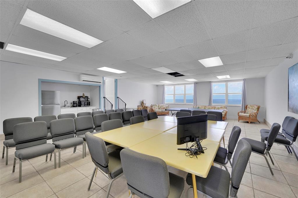 400 North Surf Road, Unit 806 Hollywood, FL 33019 - Photo 37 of 41 a view of a dining room with furniture and wooden floor
