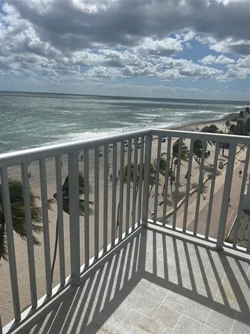 a view of a lake and a yard