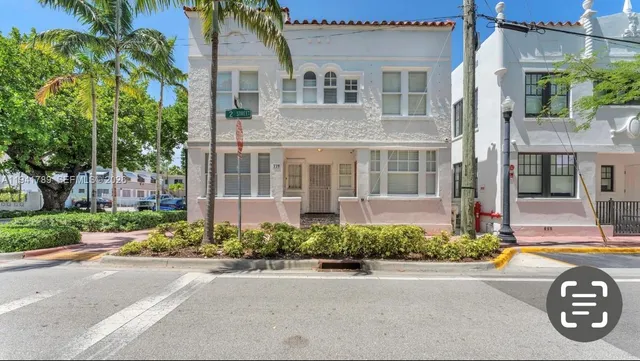 a view of street with parked cars