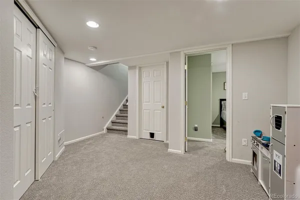 a view of a hallway with closet area