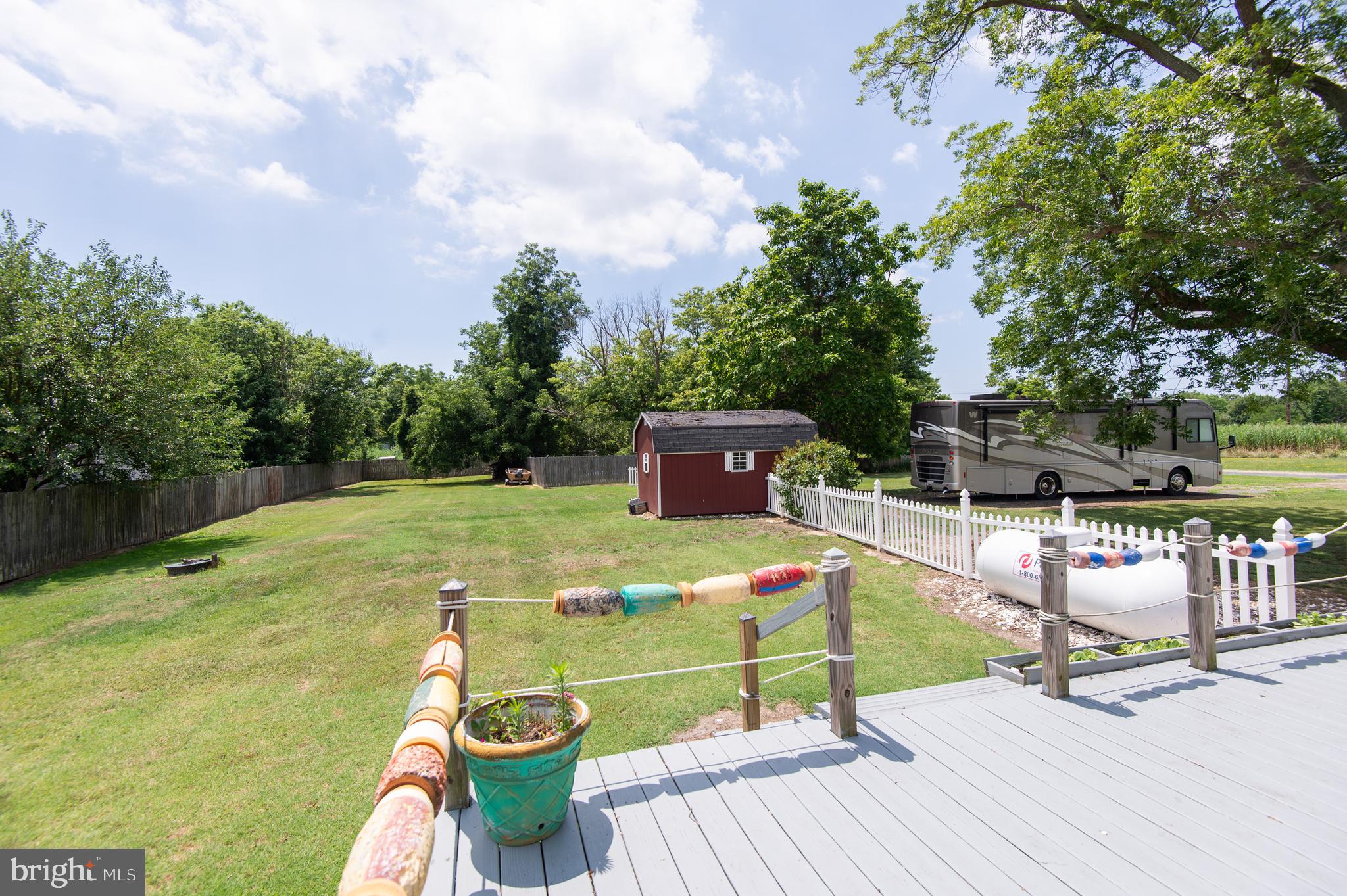 2407 Hoopers Island Road Fishing Creek, MD 21634 - Photo 50 of 69 Deck overlooking yard