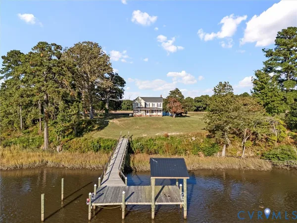 a view of a lake with a yard