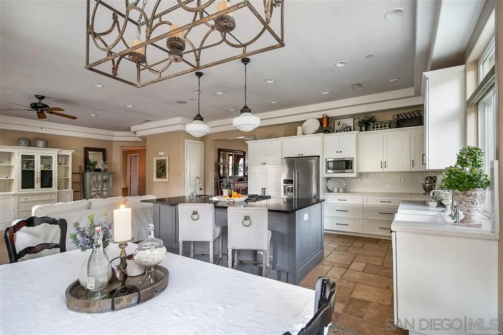 4047 Ritchie Road Santa Ysabel, CA 92070 - Photo 11 of 25 a kitchen with stainless steel appliances kitchen island granite countertop a sink and cabinets