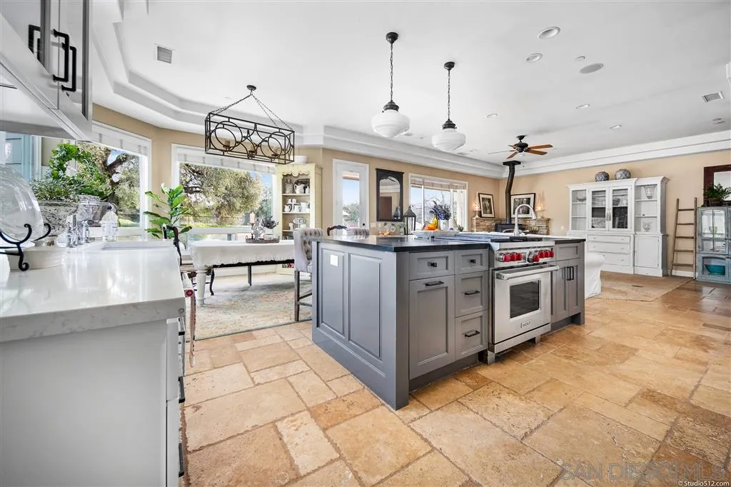 4047 Ritchie Road Santa Ysabel, CA 92070 - Photo 12 of 25 a kitchen with stainless steel appliances granite countertop a stove and cabinets