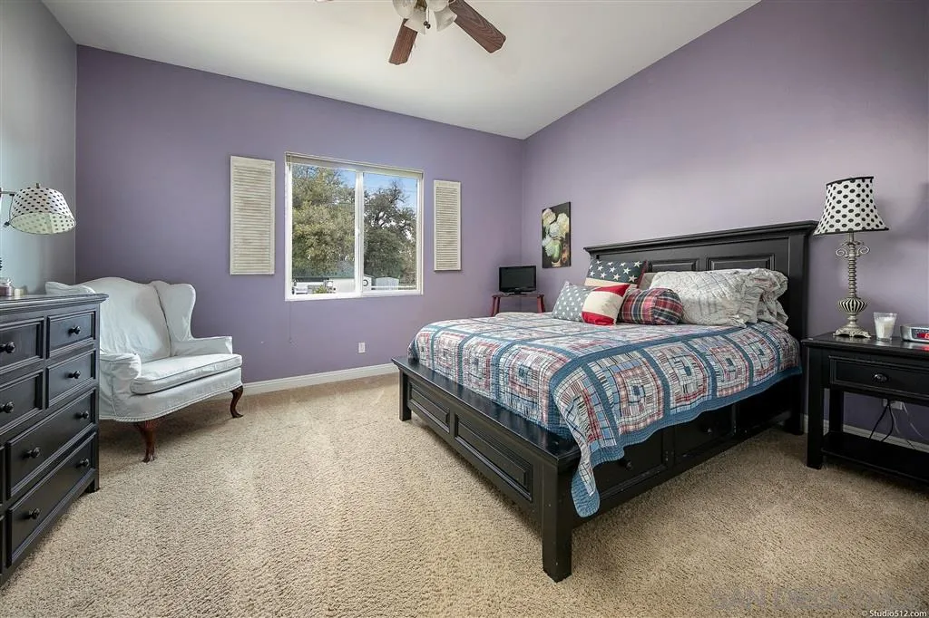 4047 Ritchie Road Santa Ysabel, CA 92070 - Photo 20 of 25 a bedroom with a bed and a window