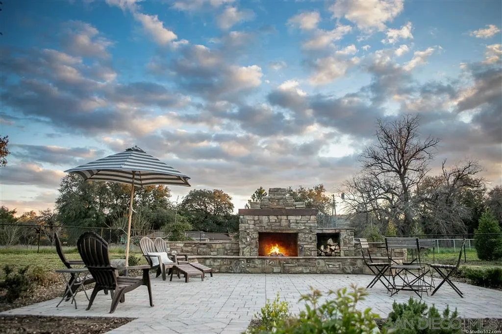 4047 Ritchie Road Santa Ysabel, CA 92070 - Photo 21 of 25 a view of a chairs and table in the patio