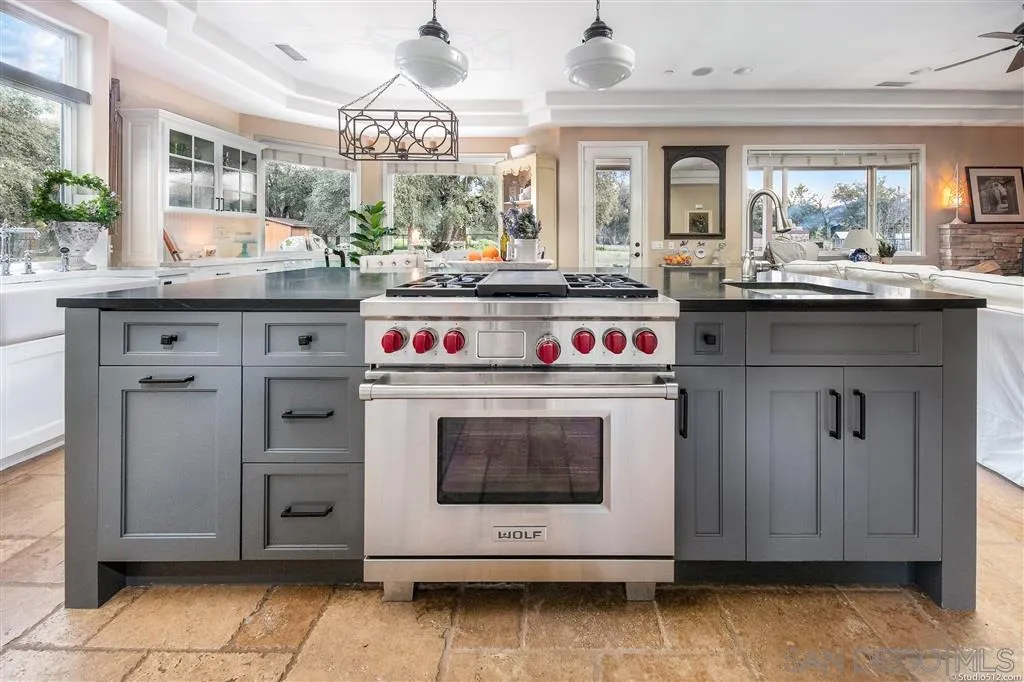 4047 Ritchie Road Santa Ysabel, CA 92070 - Photo 6 of 25 a kitchen with a stove and cabinets