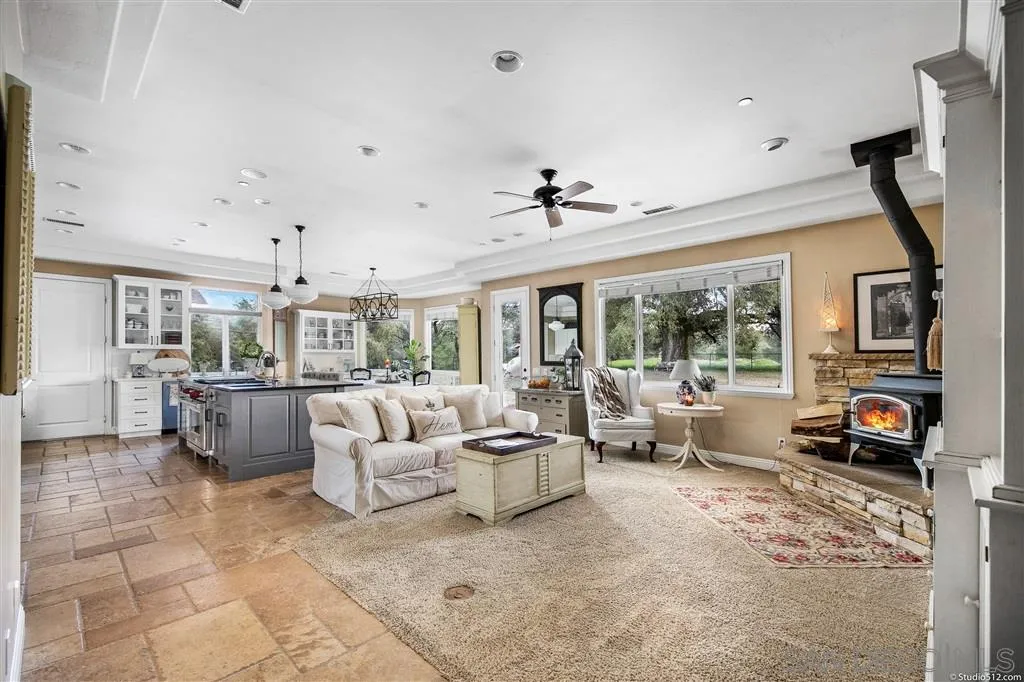 4047 Ritchie Road Santa Ysabel, CA 92070 - Photo 9 of 25 a living room with furniture and a flat screen tv